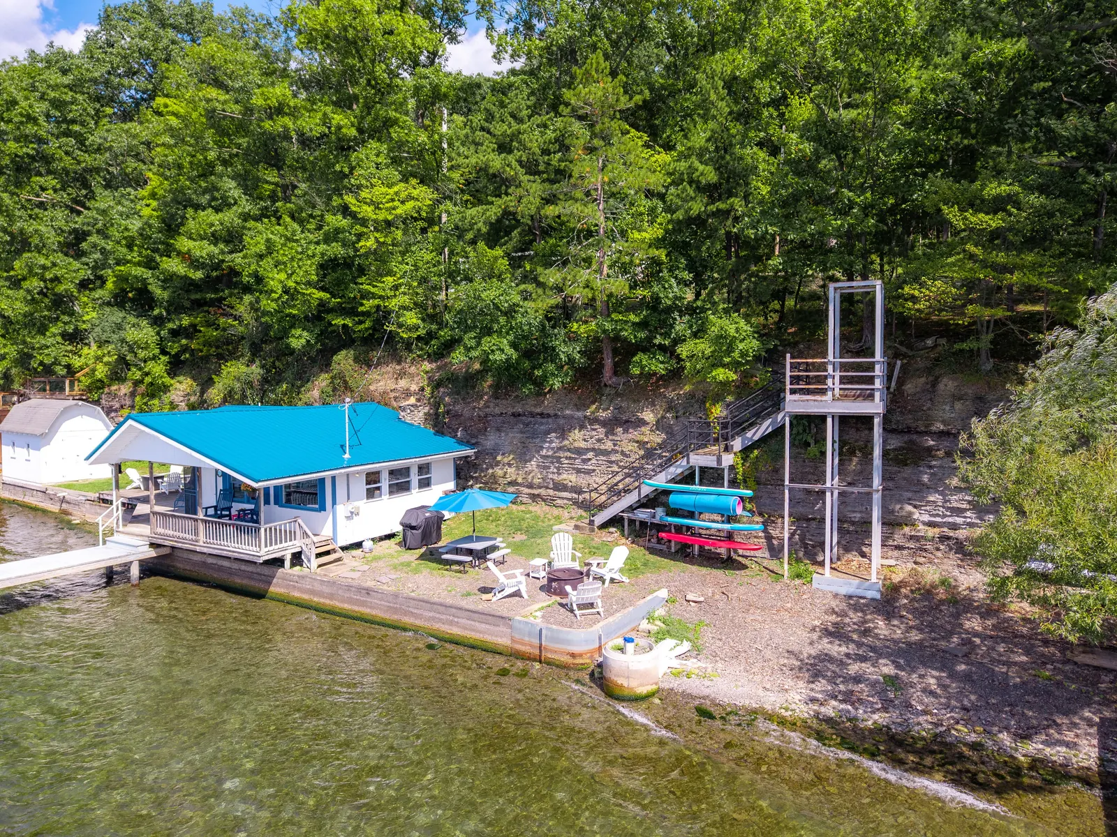 Smooth Sailing FLX — cottage, deck, and kayaks